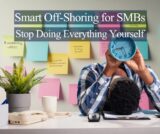 Overworked small business owner holding a clock at desk, symbolizing time pressure, burnout, and need for micro off-shoring support.