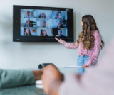 Business owner managing a remote staffing team to scale operations and reduce payroll costs