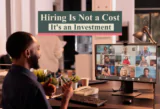 Business owner working with a remote virtual team on a laptop, representing hiring through a virtual staffing agency as a smart business investment